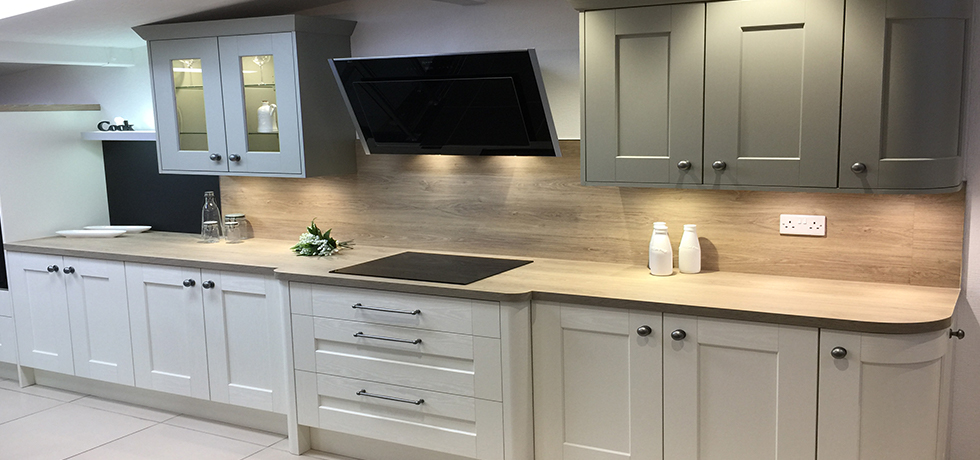 Mike Hughes Kitchen & Bedrooms Ltd displaying Omega Quebec Oak. 